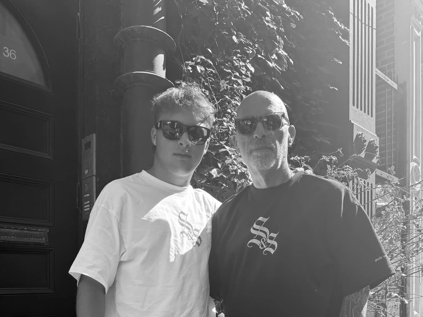 Father and son wearing Siegel & Son t-shirts